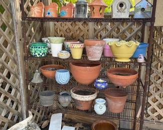 garden pots in all shapes and sizes, garden art like wall pots and bird houses