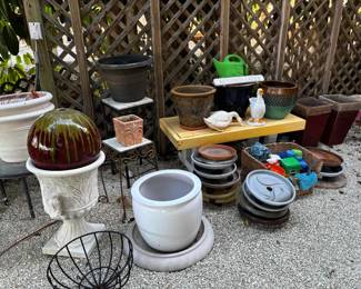 garden pots in all shapes and sizes, garden art like glazed pottery spheres