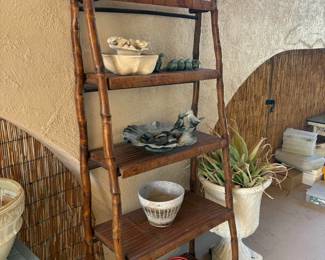 Love this ladder-style bookcase suited to live outside :)