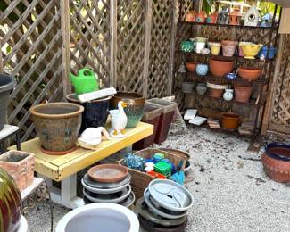 garden pots in all shapes and sizes, garden art like glazed pottery spheres