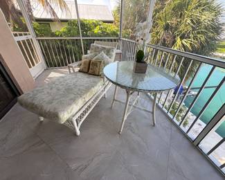 More rustic white outdoor furniture.