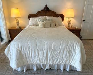 French country scroll queen bed headboard is wonderful. Also, take a look at those Drexel campaign-style side tables. (Their dresser mom is in the livingroom!)