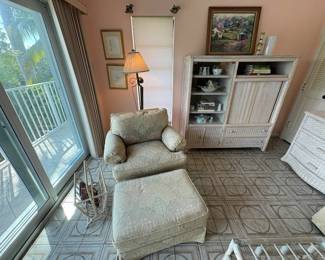 Very functional tall dresser in the back matches two three-drawer wicker dressers.
