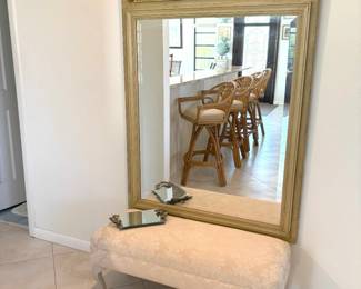 This hall mirror is so cute. We paired it with a little ottoman in the hallway and then double down again with the enamel and mirror jewelry tray :)
