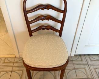 Love the bow detail on this chair back.