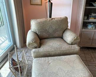 Love this custom upholstered armchair and ottoman.