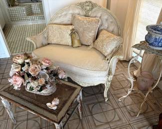 Hello, French Country! More than a chair, less than a love seat -- this white confection should go home with you! Paired nicely with that vintage little cane bench, of course!