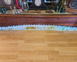 Original, double-sided artwork on a crosscut logging saw by Pauline "P'Line" Ducker (local area artist)