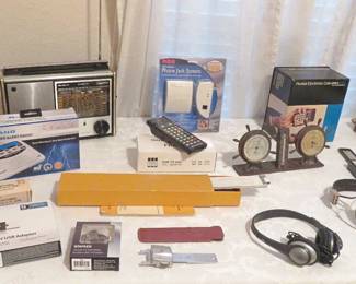 Slide rules, weather radios, barometer