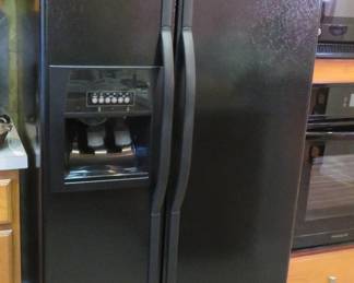 Black Whirlpool refrigerator