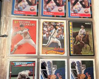 Nolan Ryan Card Binder Page A binder page of Nolan Ryan cards including three matching Texas Rangers cards, a 1987 Record Breakers card, an Astros card, and a Pinnacle Hi-Lite card showing Ryan on horseback. The cards are held in a clear nine-pocket sheet. Corners and surfaces show light handling wear. Ryan remains one of the most collected pitchers in the hobby.