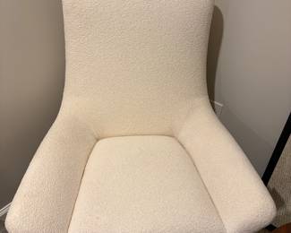 $1100. Restoration Hardware "Lario" swivel desk chair by Van Thiels. Currently online for $1895. Upholstery matches the ottoman.