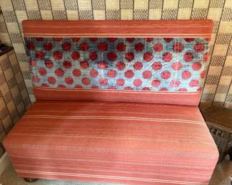 $2800. Antique Indian velvet and orange fabric banquette. 54"w x 26"d x 44" h. Wooden ball feet. Originally $9078.