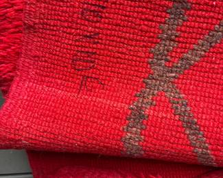 Back of the rug with weave's marking of size.