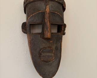 $300 West African carved wood mask. Mid 20th century