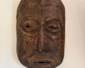 $300 West African carved wood mask mid-20th century.