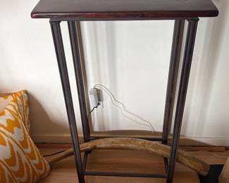 $520. Wood and metal table. Wood top is made from antique South African railroad ties.