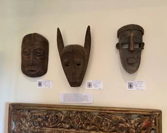 African masks for sale during in-person shopping hours.