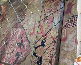 close up of the coffee table showing waterfall sides and more of the rug.