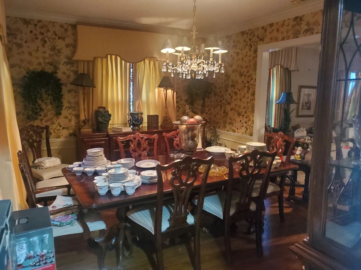 Beautiful dining room table and10 chairs with matching Hutch and sideboard