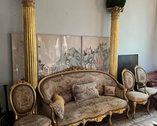 This sale has a good amount of French- and French-inspired furniture.  A prime example is in this sofa and these chairs.