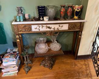 This is a photo of the other matching table, along with a number of vases that would look stunning in your house.