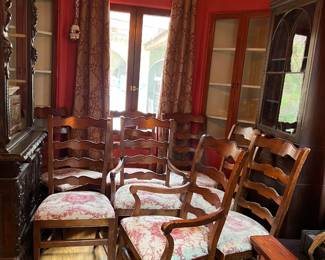 There is a set of eight matching dining chairs in this picture.  Still very serviceable.  