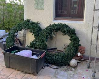 Here we have a pair of very large wreaths plus a few smaller holiday decorations in the black box.
