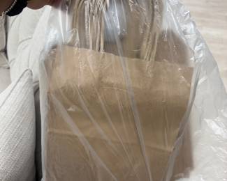 Medium sized kraft brown handled bags in packages of 25