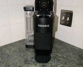 KEURIG, it makes coffee and tea, or other pod like things