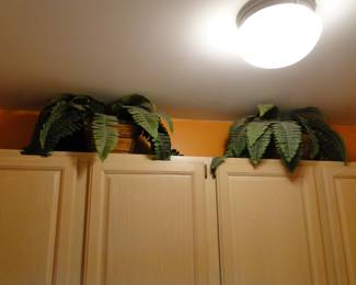 Pair of faux plants, needs dusting, but we will take care of that