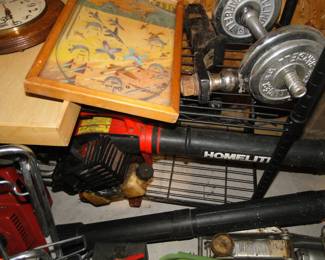 Some weights, some lawn and garden equipment, and a shelving unit too