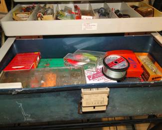 Tackle boxes filled with all kinds of fishing lures, and other fishing necessities