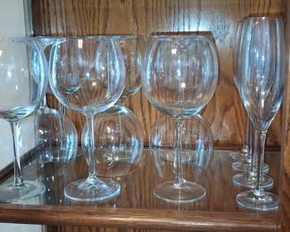 Assorted Clear Glass Stemware Collection Including Balloon Wine Glasses and Flutes