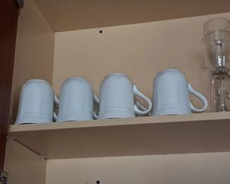 Set of Four White Ceramic Mugs