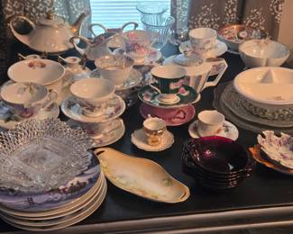 Holiday plates, cups and saucers, and serving dishes