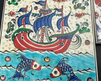 Signed pottery tile