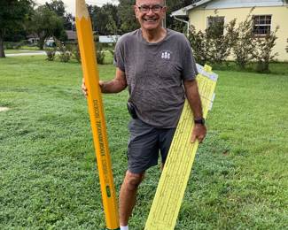 Larger than life pencil and working slide rule