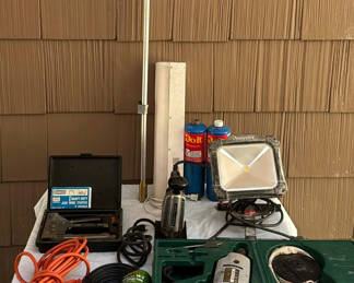 Lot 55: Assorted power tools, lighting, cords and hardware