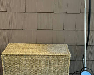 Lot 113: Wicker three-compartment laundry hamper with a portable garment steamer