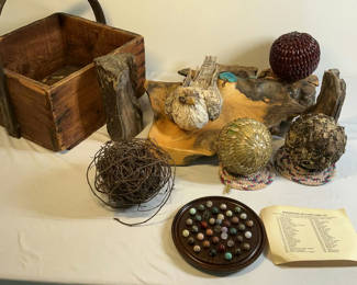Lot 26: Rustic wooden items, petrified wood, woven spheres, and bead display