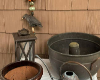 Lot 64: Assorted garden decor and containers