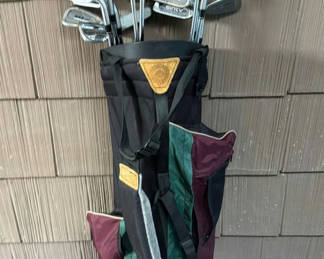 Lot 124: Golf bag with clubs