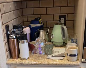electric tea kettle, drinking bottles with lids, tea pots