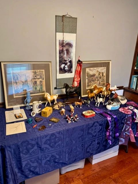 Equestrian items and collectible Breyer horse models.