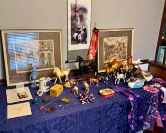Equestrian items and collectible Breyer horse models.