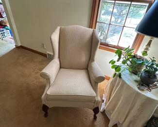 Wingback chair, cream colored