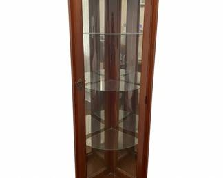 Vintage Lighted Corner Curio Cabinet with Mirrored Back and Carved Details second image