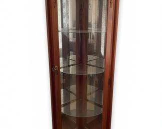 Vintage Lighted Corner Curio Cabinet with Mirrored Back and Carved Details third image
