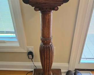 Tall, ornate oak carved plant stand